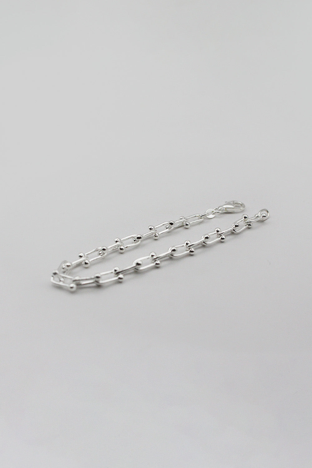 Ball and oval link chain bracelet