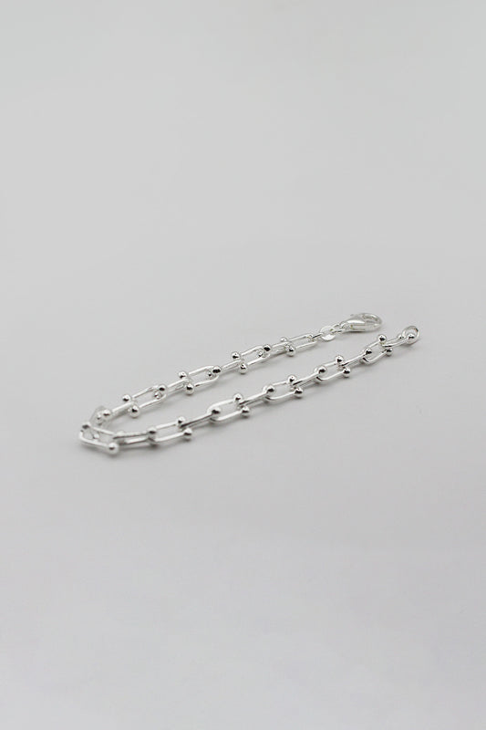 Ball and oval link chain bracelet